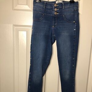 Big girls jeans. Size 14. Star studs on the sides. Amazing fit and style.